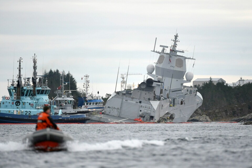 Fregatten KNM Helge Ingstad havarerte i 2018. Fregatten KNM Helge Ingstad etter kollisjonen med Sola TS ved Stureterminalen i Øygarden 8. november 2018. Foto: Marit Hommedal / NTB / NPK