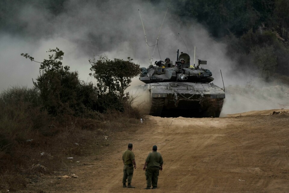 Israelske stridsvogner manøvrerer i det nordlige Israel tirsdag 1. oktober. Israelske stridsvogner manøvrerer i det nordlige Israel tirsdag 1. oktober. Foto: Baz Ratner / AP / NTB