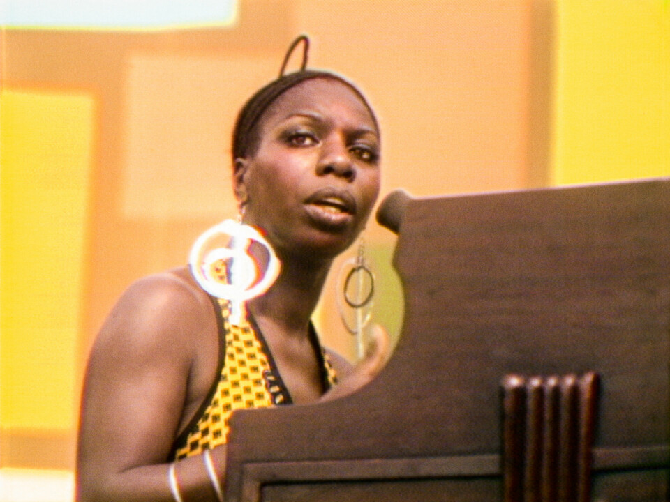 Nina Simone performs at the Harlem Cultural Festival in 1969, featured in the documentary SUMMER OF SOUL. Photo Courtesy of Searchlight Pictures. © 2021 20th Century Studios All Rights Reserved Nina Simone performs at the Harlem Cultural Festival in 1969, featured in the documentary SUMMER OF SOUL. Photo Courtesy of Searchlight Pictures. © 2021 20th Century Studios All Rights Reserved