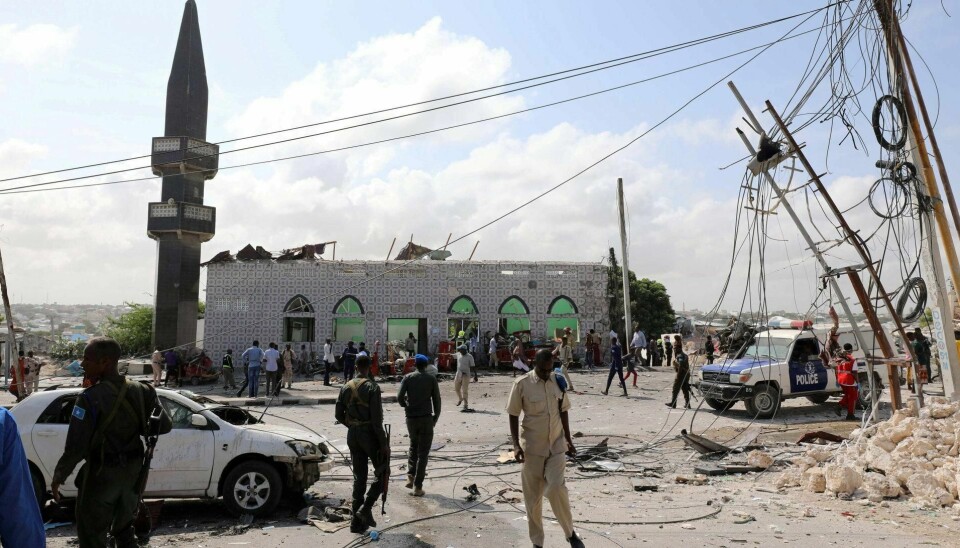 SOMALIA: Med regjeringens opphørpraksis, risikerer somaliske flyktninger å måtte returnere til hovedstaden Mogadishu – i strid med flyktningkonvensjonen, skriver Mona Reigstad Dabour.. Sist lørdag ble minst 11 mennesker drept og 25 såret i to bilbombeangrep i Mogadishu. FOTO: FEISAL OMAR/NTB SCANPIX
