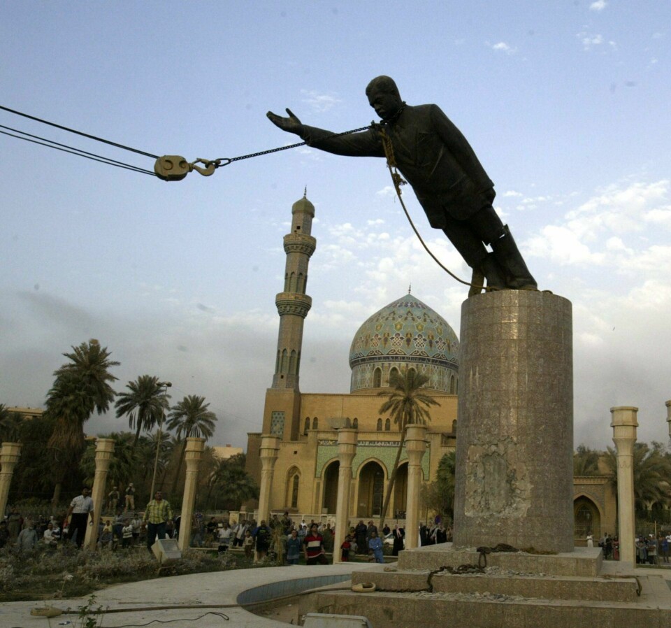 KRIG? I år er det 15 år siden Saddam Husseins regime i Irak ble styrtet. Lawrene Wilkerson, stabssjef for tidligere utenriksminister Colin Powell, ser nå tegn på at USAs ledere ønsker krig mot Iran. FOTO: JEROME DELAY/NTB SCANPIX