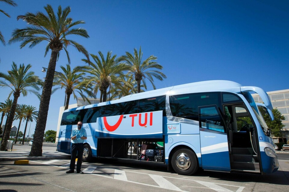 A bus driver wearing a face mask and gloves waits to greet tourists outside the Son Sant Joan airport in Palma de Mallorca on June 22, 2020 as EU member state citizens and those from the passport-free Schengen zone were allowed freely into Spain, with no 14-day quarantines required following a national lockdown to stop the spread of the novel coronavirus. (Photo by JAIME REINA / AFP) A bus driver wearing a face mask and gloves waits to greet tourists outside the Son Sant Joan airport in Palma de Mallorca on June 22, 2020 as EU member state citizens and those from the passport-free Schengen zone were allowed freely into Spain, with no 14-day quarantines required following a national lockdown to stop the spread of the novel coronavirus. (Photo by JAIME REINA / AFP)