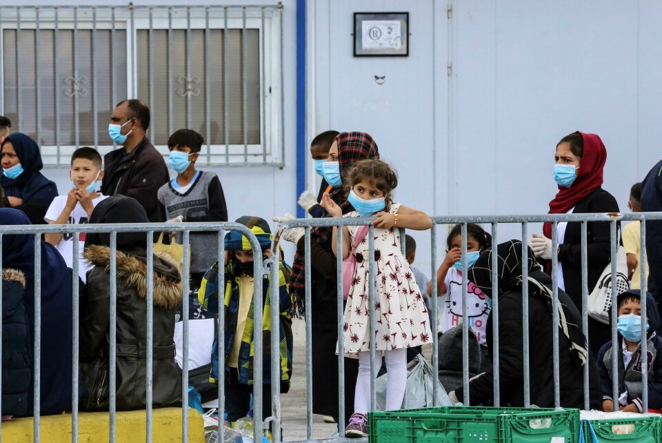 (FILES) In this file photo taken on May 3, 2020 migrants wait at the port of Mytilene to be transferred from the island of Lesbos to the Greek main land in Moria. - Greece will extend to May 21 a coronavirus lockdown imposed since March on migrant camps and which had been expected to be lifted from May 11, 2020, the authorities said. 'The coronavirus measures of confinement for those living in migrant camps and in reception centres in Greece are prolonged until May 21,' the migration and asylum ministry said in a statement on Sunday, six days after the first easing of the general lockdown in the country. The ministry did not say why the camp lockdown was being extended. (Photo by Manolis Lagoutaris / AFP) (FILES) In this file photo taken on May 3, 2020 migrants wait at the port of Mytilene to be transferred from the island of Lesbos to the Greek main land in Moria. - Greece will extend to May 21 a coronavirus lockdown imposed since March on migrant camps and which had been expected to be lifted from May 11, 2020, the authorities said. 'The coronavirus measures of confinement for those living in migrant camps and in reception centres in Greece are prolonged until May 21,' the migration and asylum ministry said in a statement on Sunday, six days after the first easing of the general lockdown in the country. The ministry did not say why the camp lockdown was being extended. (Photo by Manolis Lagoutaris / AFP)
