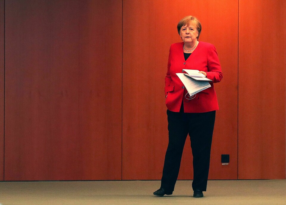 German Chancellor Angela Merkel waits for the beginning of a news conference after an online meeting with German state governors on the loosening of the restrictions to reduce the spread of the coronavirus disease (COVID-19), in Berlin, Germany May 6, 2020. Michael Sohn/Pool via REUTERS German Chancellor Angela Merkel waits for the beginning of a news conference after an online meeting with German state governors on the loosening of the restrictions to reduce the spread of the coronavirus disease (COVID-19), in Berlin, Germany May 6, 2020. Michael Sohn/Pool via REUTERS