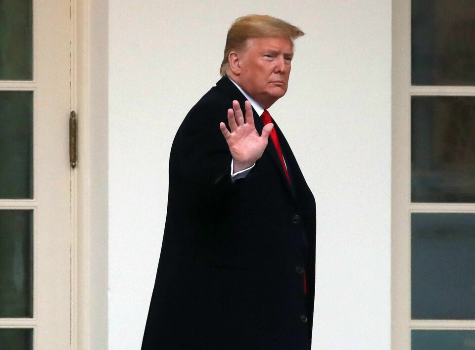 WASHINGTON, DC - JANUARY 13: U.S. President Donald Trump waves as he walks along the West Wing Colonnade before departing from the White House on January 13, 2020 in Washington, DC. President Trump is traveling to Kenner, LA to attend the college football national playoff championship game. Mark Wilson/Getty Images/AFP== FOR NEWSPAPERS, INTERNET, TELCOS & TELEVISION USE ONLY ==