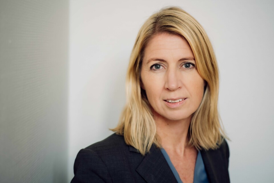 Mina Gerhardsen Portrett av kvinne med blond hår og svart blazer.