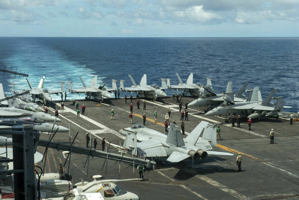 Kampfly på hangarskipet USS Theodore Roosevelt avbildet 4. juli i Sørkinahavet, på vei til Rødehavet. Kampfly på hangarskipet USS Theodore Roosevelt avbildet 4. juli i Sørkinahavet, på vei til Rødehavet. Foto: Seaman Ryan Holloway / U.S. Navy / AP / NTB