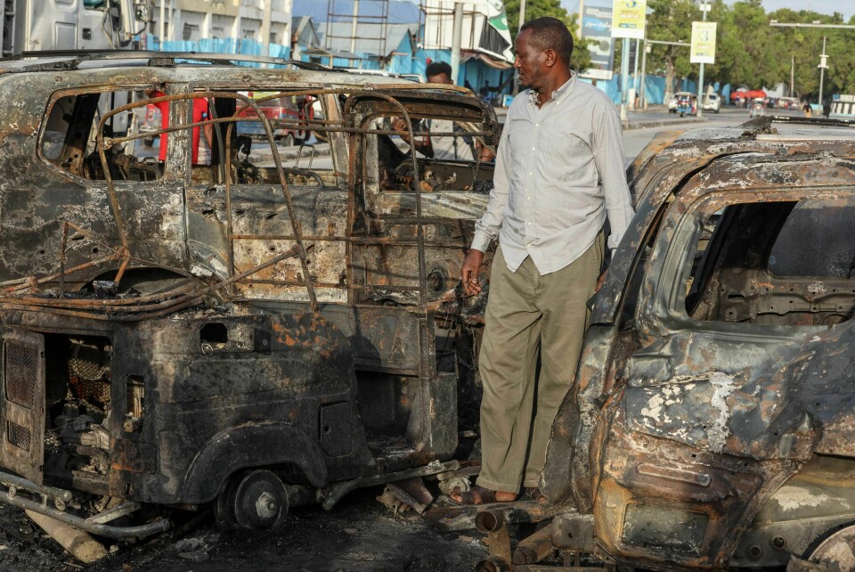 A man looks at the debris and destruction at a cafe in Mogadishu on July 15, 2024 following a car bomb blast where five people were killed where football fans were watching the Euro 2024 final late on July 14, 2024. A man looks at the debris and destruction at a cafe in Mogadishu on July 15, 2024 following a car bomb blast where five people were killed where football fans were watching the Euro 2024 final late on July 14, 2024.