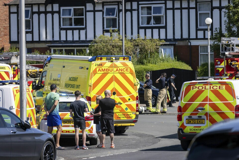 Politi og ambulanser ved åstedet for knivangrepet i Southport. Politi og ambulanser ved åstedet for knivangrepet i Southport. Foto: James Speakman / PA / AP / NTB