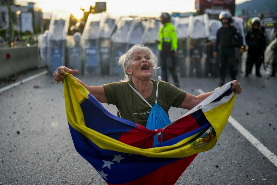 Consuelo Marquez er blant demonstrantene som bestrider valgresultatet i Venezuela. Consuelo Marquez er blant demonstrantene som bestrider valgresultatet i Venezuela. Foto: Matias Delacroix / AP / NTB