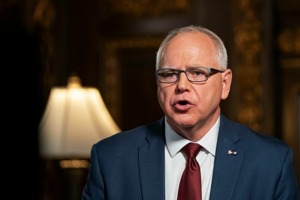 Minnesota-guvernør Tim Walz. FILE - Minnesota Gov. Tim Walz speaks from the Governor's Reception room at the State Capitol, to discuss the latest steps in his response to COVID-19, Wednesday, Nov. 18, 2020, in St. Paul, Minn. Faulting inaction in Washington, governors and state lawmakers are racing to get needed pandemic relief to small businesses, the unemployed, renters and others affected by the widening coronavirus outbreak. (Glen Stubbe/Star Tribune via AP, Pool, File)