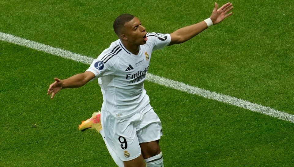 Kylian Mbappé jubler etter å ha scoret sitt første mål for Real Madrid i debutkampen. Atalanta ble slått 2-0 i den europeiske supercupen. Kylian Mbappé jubler etter å ha scoret sitt første mål for Real Madrid i debutkampen. Atalanta ble slått 2-0 i den europeiske supercupen. Foto: Darko Vojinovic, AP / NTB
