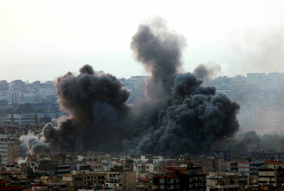 Et Hizbollah-sterkt område av Beirut ble rammet av et israelsk luftangrep i juli 2006. Et Hizbollah-sterkt område av Beirut ble rammet av et israelsk luftangrep i juli 2006. Foto: Hussein Malla / AP / NTB