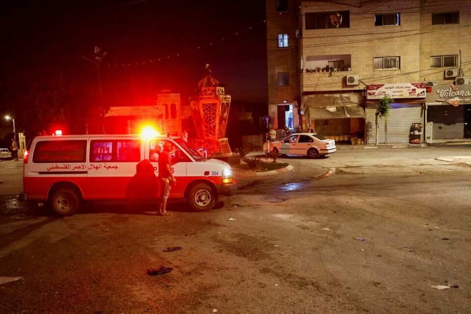 En ambulanse på stedet etter et israelsk angrep i byen Tubas på Vestbredden. An ambulance is seen at the site of Israeli strikes where Palestinians were killed, in Tubas in the Israeli-occupied West Bank, September 11, 2024. REUTERS/Raneen Sawafta