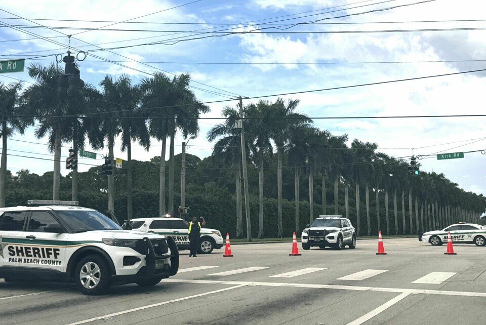 Det var stort politioppbud utenfor Trump International Golf Club etter at det ble meldt om skyting i nærheten av Donald Trump. Det var stort politioppbud utenfor Trump International Golf Club etter at det ble meldt om skyting i nærheten av Donald Trump. Foto: Stephanie Matat / AP / NTB