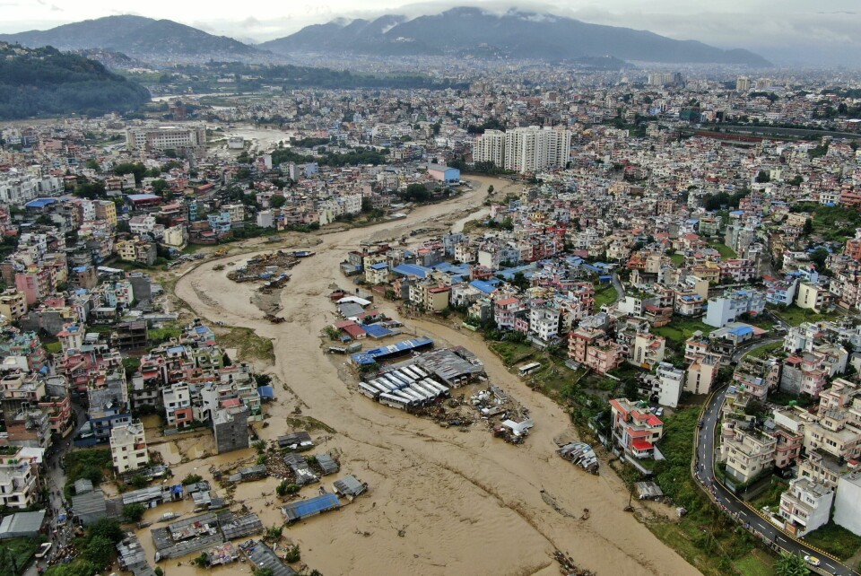 Bagmati-elva i Katmandu-dalen har gått over sine bredder etter vedvarende regnvær i Nepal. Mer enn 100 mennesker har mistet livet i flom og skred i landet, og mange er savnet. Foto: Gopen Rai / AP / NTB Bagmati-elva i Katmandu-dalen har gått over sine bredder etter vedvarende regnvær i Nepal. Minst 66 har mistet livet i flom og skred i landet, og flere titall er savnet. Foto: Gopen Rai / AP / NTB