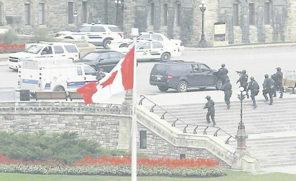 Flere ble skadet i skuddvekslinger i Canada i går morges canadisk tid. FOTO: CHRIS WATTIE/NTB SCANPIX