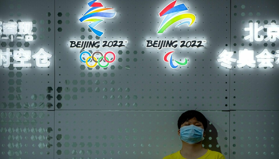 Beijing-OL vil bli avviklet under strenge smitteverntiltak. Beijing-OL vil bli avviklet under strenge smitteverntiltak. Foto: Mark Schiefelbein / AP / NTB