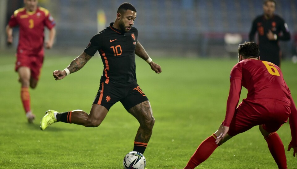 Memphis Depay scoret to ganger for Nederland, men det holdt ikke til seier i Montenegro. Norges gruppe i VM-kvalifiseringen lever for fullt. Memphis Depay scoret to ganger for Nederland, men det holdt ikke til seier i Montenegro. Norges gruppe i VM-kvalifiseringen lever for fullt. Foto: Risto Bozovic / AP / NTB