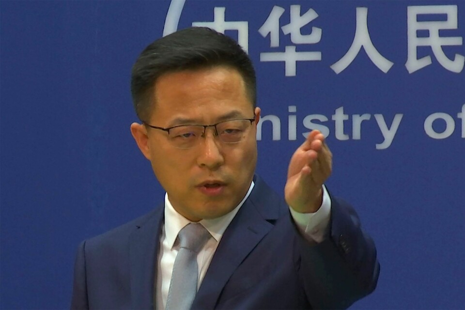 Talsperson for utenriksdepartementet, Zhao Lijian, mener OL vil la seg gjennomføre. Zhao Lijian (Foto: Lui Zheng / AP / NTB