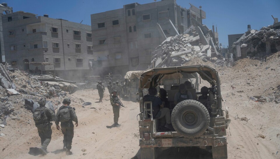 Israelske soldater i områder i Gaza som er lagt i grus under krigen. Israelske soldater i områder i Gaza som er lagt i grus under krigen. Foto: Ohad Zwigenberg / AP / NTB