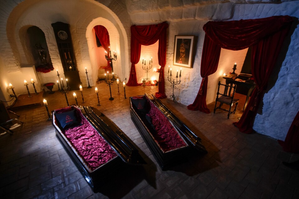 In this picture taken Oct. 9, 2016, two coffins are lit before a photo shoot in Bran Castle, in Bran, Romania. Airbnb has launched a contest to find two people to stay overnight in the castle on Halloween, popularly known as Dracula’s castle because of its connection to the cruel real-life prince Vlad the Impaler, who inspired the legend of Dracula. (AP Photo/Andreea Alexandru) In this picture taken Oct. 9, 2016, two coffins are lit before a photo shoot in Bran Castle, in Bran, Romania. Airbnb has launched a contest to find two people to stay overnight in the castle on Halloween, popularly known as Dracula’s castle because of its connection to the cruel real-life prince Vlad the Impaler, who inspired the legend of Dracula. (AP Photo/Andreea Alexandru)