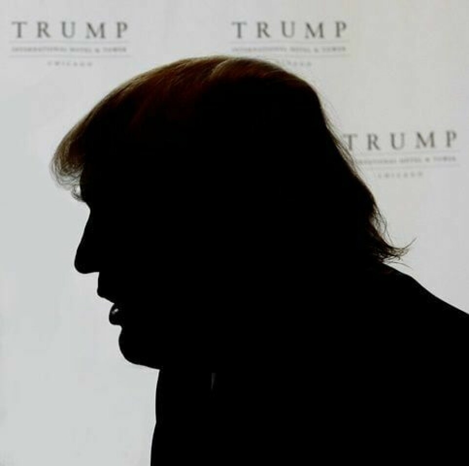 TRUMPS SKYGGE: Med en humørsyk og autoritær narsissist i Det hvite hus er det ingen grunn til å tro at 2017 blir bedre enn 2016. FOTO: CHARLES REX ARBOGAST/NTB SCANPIX