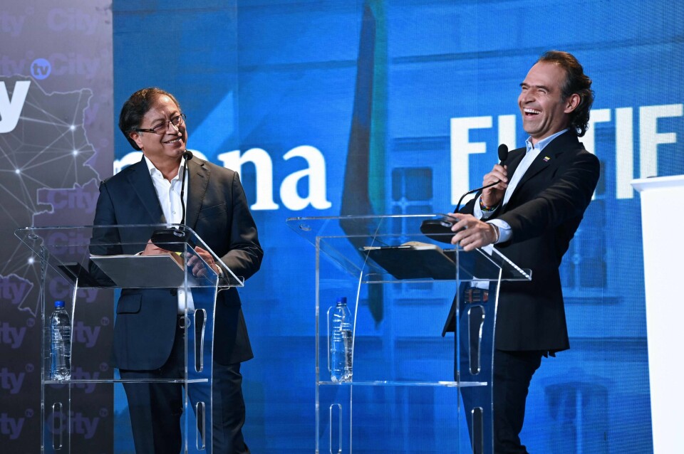 Presidentkandidatene Gustavo Petro (t.v.) og Federico Gutierrez (t.h.) møttes til debatt før søndagens valg. De to ligger best an på målingene. Presidentkandidatene Gustavo Petro (t.v.) og Federico Gutierrez (t.h.) møttes til debatt før søndagens valg. De to ligger best an på målingene.