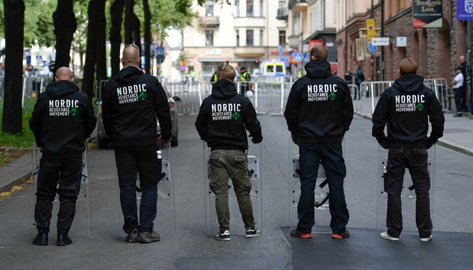 Medlemmer av den nynazistiske gruppen nordiske motståndsrörelsen (NMR) demonstrerer på Kungsholms torg i Stockholm i august 2018. Bildet viser medlemmer av den nynazistiske gruppen nordiske motståndsrørelsen (NMR) som demonstrerer på Kungsholms torg i Stockholm i august 2018.