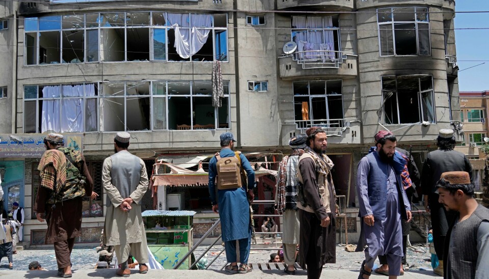 Taliban-krigere holder vakt utenfor sikh-tempelet etter lørdagens angrep. Foto: Ebrahim Noroozi / AP / NTB Taliban-krigere holder vakt utenfor sikh-tempelet etter lørdagens angrep. Foto: Ebrahim Noroozi / AP / NTB