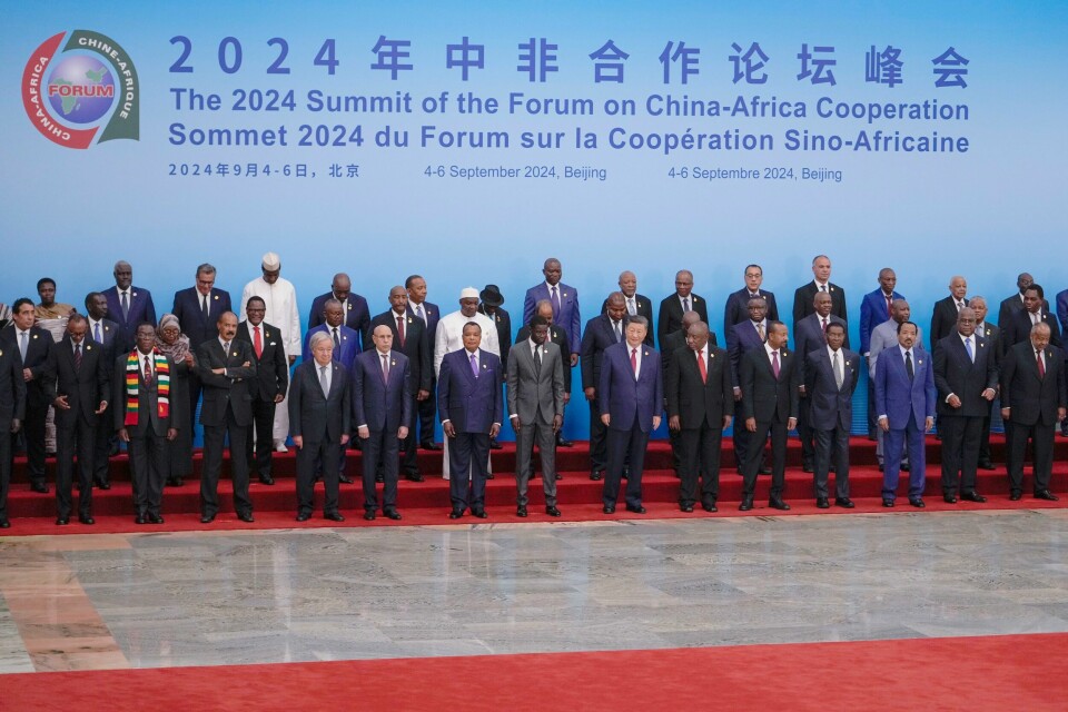 Kinas president Xi Jinping sammen med afrikanske ledere ved åpningen av et toppmøte mellom Kina og Afrika. Kinas president Xi Jinping sammen med afrikanske ledere ved åpningen av et toppmøte mellom Kina og Afrika. Foto: Andy Wong / AP / NTB