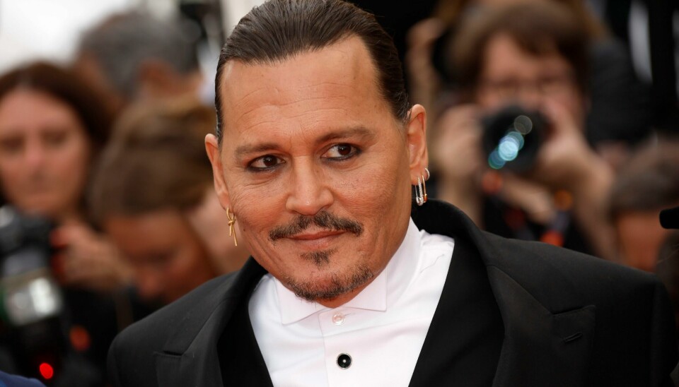 Johnny Depp poserte foran fotografene ved ankomsten til åpningsseremonien tirsdag kveld. Johnny Depp poserte foran fotografene ved ankomsten til åpningsseremonien tirsdag kveld. Foto: Joel C Ryan / Invision / AP / NTB