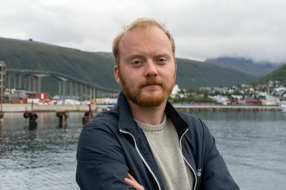 Ole Marius Minde Johnsen Mann med oransje hår, armene i kors, seriøst smil