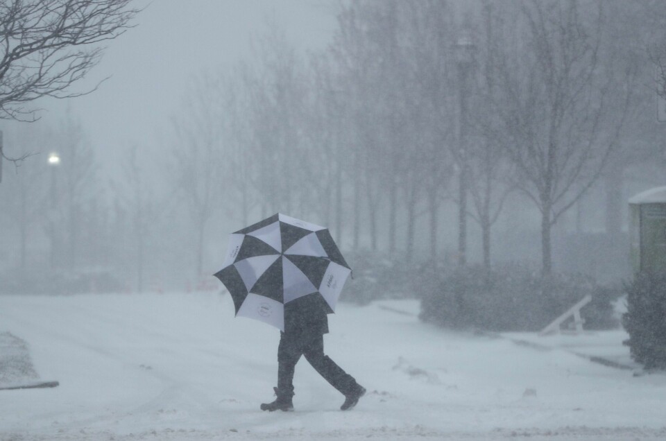 Illustrasjonsfoto. DÅRLIG PÅSKEVÆR: Natt til onsdag i påskeuka kommer det inn en værfront som vil bevege seg over Sør-Norge og skape nedbør, melder meterologene. Bildet er fra en snøstorm i New Jersey i februar i år.