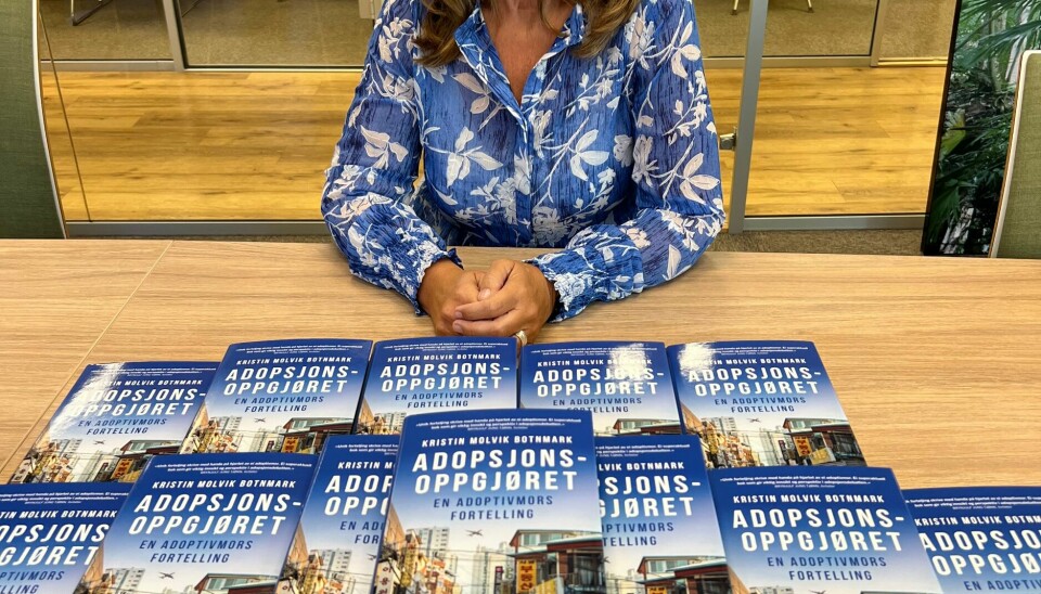 I boken går hun hardt ut mot det hun kaller «adopsjonsindustrien». Kristin Molvik Botnmark og boken Adopsjonsopprøret