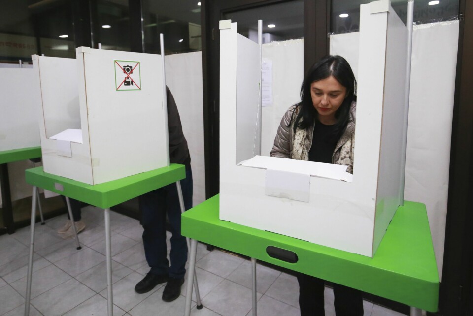 Velgere i Georgia avgir sine stemmer lørdag. Velgere i Georgia avgir sine stemmer lørdag. Foto: Zurab Tsertsvadze / AP / NTB