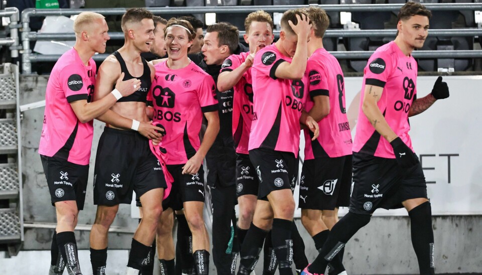 HamKams spillere jubler etter 1-0 scoring til Henrik Udahl HamKam sikret seieren på overtid. Foto: Geir Olsen / NTB