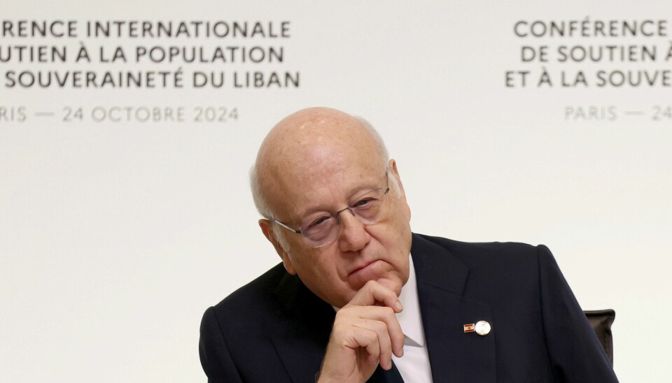 Libanons fungerende statsminister Najib Mikati sier han håper det snart kan komme på plass en våpenhvile mellom Israel og Hizbollah. Libanons statsminister Najib Mikati jobber for en våpenhvile mellom Hizbollah og israelske styrker. Han mener kun staten bør bære våpen. Foto: Alain Jocard / AP / NTB