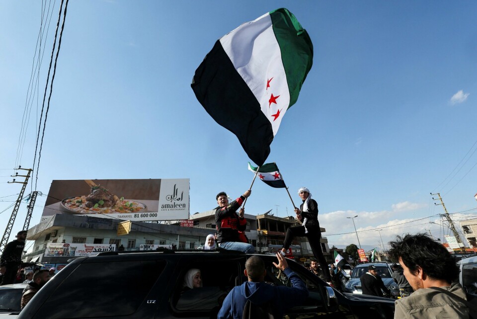 Folk feirer Assad-regimets fall på grensen mellom Syria og Libanon. Folk feirer Assad-regimets fall på grensen mellom Syria og Libanon.