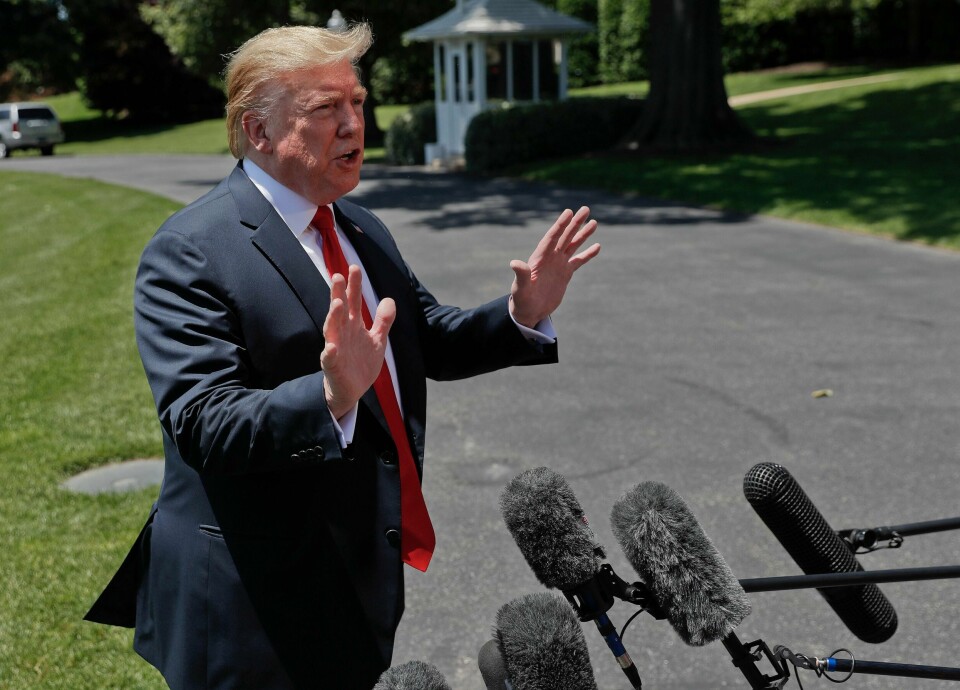 President Donald Trump speaks to members of the media on the South Lawn of the White House in Washington, Friday, May 24, 2019, before boarding Marine One for a short trip to Andrews Air Force Base, Md., and then on to Tokyo. (AP Photo/Pablo Martinez Monsivais)