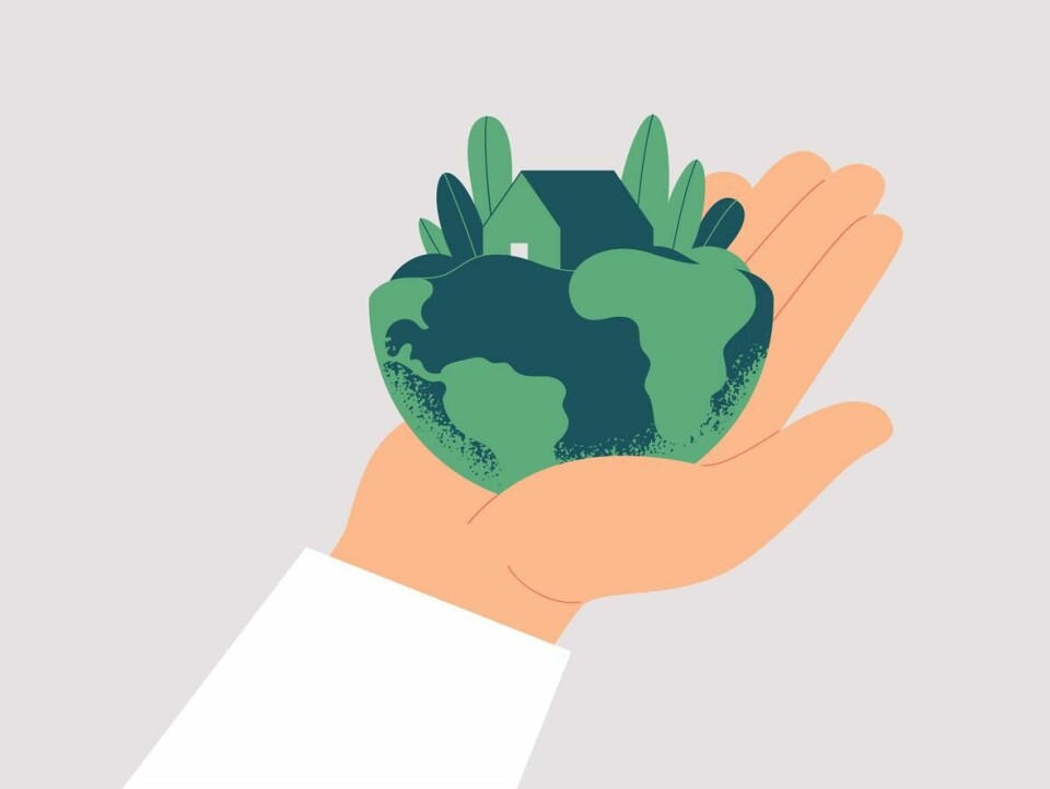 Illustrasjon: Istock Human hand carefully holds planet Earth. Green house is among leaves on the males palm. Ecological concept fo save the Earth. Vector illustration isolated from background