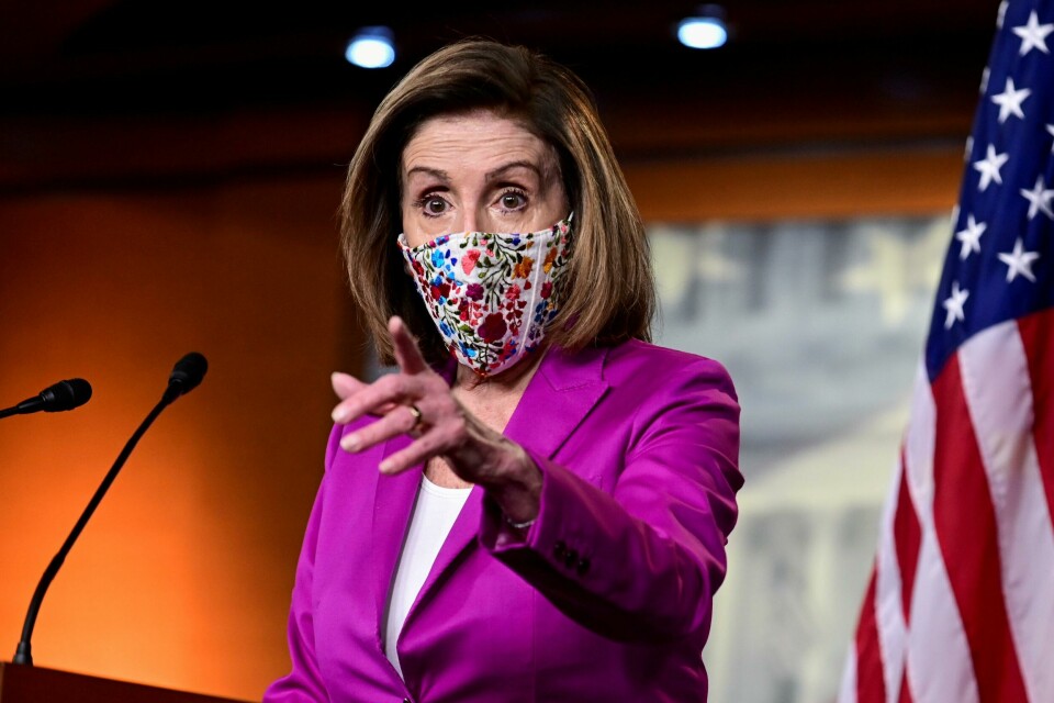FILE PHOTO: U.S. House Speaker Nancy Pelosi (D-CA) speaks to reporters a day after supporters of U.S. President Donald Trump occupied the Capitol, during a news conference in Washington, U.S., January 7, 2021. REUTERS/Erin Scott/File Photo FILE PHOTO: U.S. House Speaker Nancy Pelosi (D-CA) speaks to reporters a day after supporters of U.S. President Donald Trump occupied the Capitol, during a news conference in Washington, U.S., January 7, 2021. REUTERS/Erin Scott/File Photo