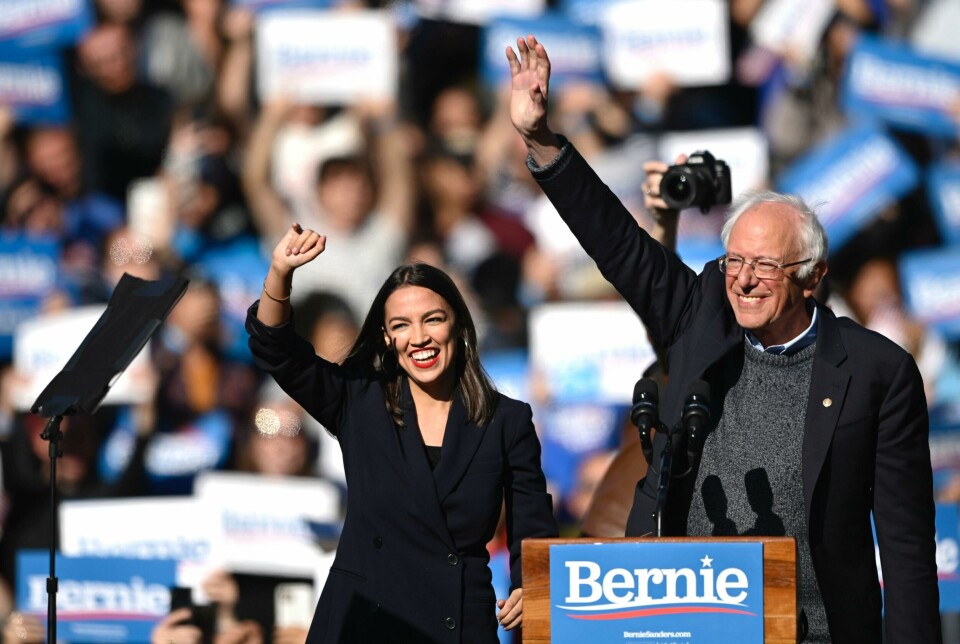 (FILES) In this file photo taken on October 19, 2019, 2020 Democratic presidential hopeful US Senator Bernie Sanders (D-VT) and representative Alexandria Ocasio-Cortez (D-NY) wave to a crowd of supporters during a campaign rally in New York City. - During Biden's campaign, Democratic socialists like Ocasio-Cortez and Vermont's Senator Bernie Sanders -- the runner-up in the 2016 and 2020 primaries -- buried the hatchet with the party's moderates and helped get out the vote. But as the dust settles it is clear that the tensions that arose during the primary over healthcare, student debt and combating climate change and inequality haven't gone anywhere. (Photo by Johannes EISELE / AFP) (FILES) In this file photo taken on October 19, 2019, 2020 Democratic presidential hopeful US Senator Bernie Sanders (D-VT) and representative Alexandria Ocasio-Cortez (D-NY) wave to a crowd of supporters during a campaign rally in New York City. - During Biden's campaign, Democratic socialists like Ocasio-Cortez and Vermont's Senator Bernie Sanders -- the runner-up in the 2016 and 2020 primaries -- buried the hatchet with the party's moderates and helped get out the vote. But as the dust settles it is clear that the tensions that arose during the primary over healthcare, student debt and combating climate change and inequality haven't gone anywhere. (Photo by Johannes EISELE / AFP)