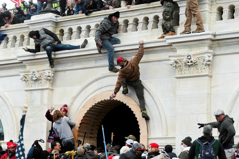 FILE PHOTO: Supporters of U.S. President Donald Trump climb on walls at the U.S. Capitol during a protest against the certification of the 2020 U.S. presidential election results by the U.S. Congress, in Washington, U.S., January 6, 2021. REUTERS/Stephanie Keith/File Photo FILE PHOTO: Supporters of U.S. President Donald Trump climb on walls at the U.S. Capitol during a protest against the certification of the 2020 U.S. presidential election results by the U.S. Congress, in Washington, U.S., January 6, 2021. REUTERS/Stephanie Keith/File Photo