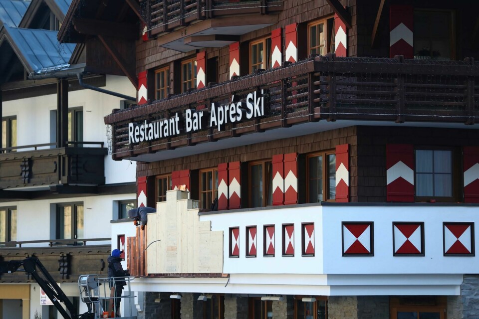 Worker prepare a balcony at a restaurant and bar in Ischgl, Austria, Thursday, Nov. 26, 2020. The Austrian government imposed a second lockdown to slow down the ongoing pandemic of the COVID-19 disease caused by the SARS-CoV-2 coronavirus from Nov. 17, 2020 until at least Dec. 6, 2020. (AP Photo/Matthias Schrader) Worker prepare a balcony at a restaurant and bar in Ischgl, Austria, Thursday, Nov. 26, 2020. The Austrian government imposed a second lockdown to slow down the ongoing pandemic of the COVID-19 disease caused by the SARS-CoV-2 coronavirus from Nov. 17, 2020 until at least Dec. 6, 2020. (AP Photo/Matthias Schrader)
