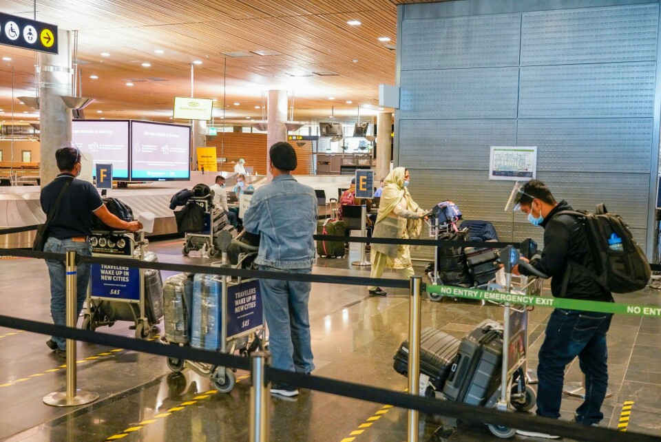 Køene på flyplassene kan bli langt kortere hvis alle dem som sier at de vil fly mindre også i etterkant av koronapandemien, omsetter det i praktisk handling. Gardermoen 20210126. Koronatest. Passasjerer fra Doha og Dubai testes for covid-19 etter ankomst i Norge. Helsemyndighetene i Ullensaker kommune har etablert et eget testsenter på Oslo lufthavn Gardermoen for passasjerer som ankommer Norge fra utlandet.Foto: Heiko Junge / NTB