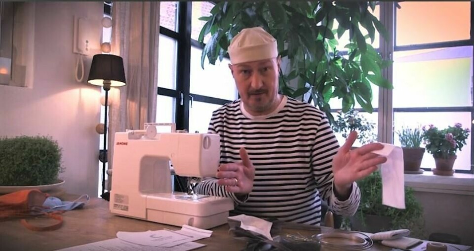 Klesdesigner Kjell Nordström syr munnbind ###