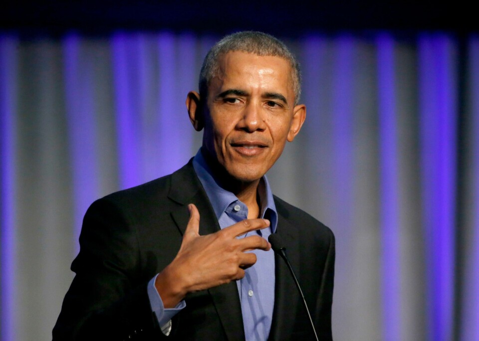 FILE - In this Dec. 5, 2017, file photo, former President Barack Obama address the participants at a summit on climate change in Chicago. Obama made an unannounced appearance at an NBA Cares event during All-Star weekend in his hometown of Chicago with several of the leagues top rookies, second-year players and coaches. The event Friday, Feb. 14, 2020, was for volunteers to fill several backpacks with school supplies, and that work predictably stopped when Obama walked into the room.(AP Photo/Charles Rex Arbogast, File)