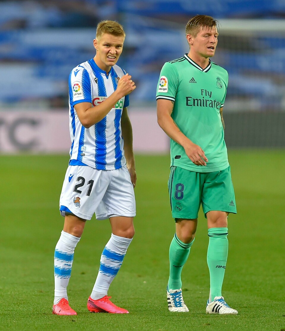 Martin Ødegaard og Toni Kroos i søndagens duell.