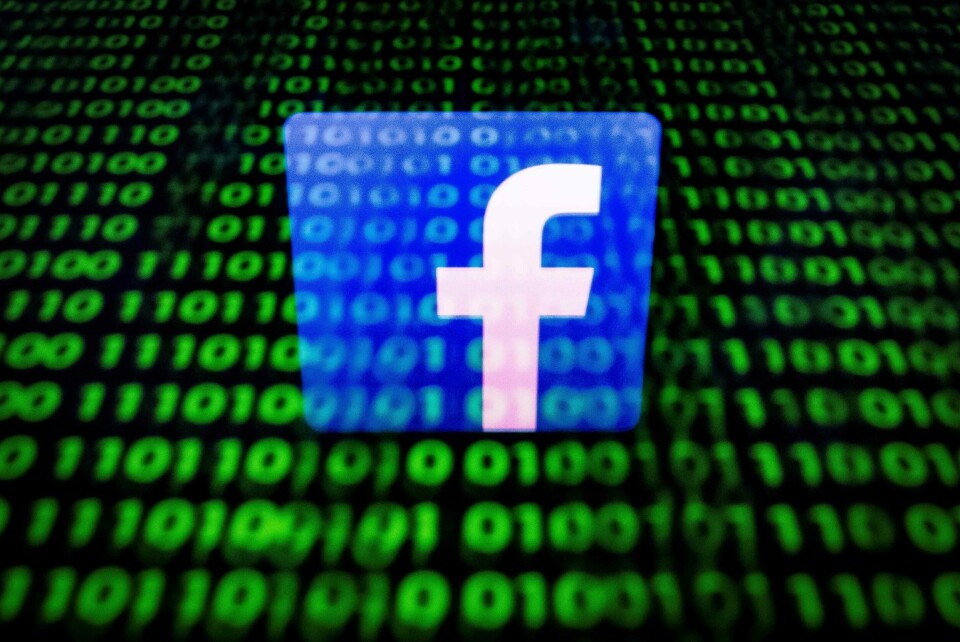 (FILES) In this file photo taken on April 26, 2018 in Paris shows the logo of social network Facebook displayed on a screen and reflected on a tablet. - Facebook announced it identified stealth misinformation campaigns from Russia and Iran and shut down hundreds of accounts as part of its battle against manipulation of its platform, prompting a fresh denial from Moscow on August 22, 2018. The social network said late Tuesday that it removed more than 650 pages, groups and accounts identified as 'networks of accounts misleading people about what they were doing,' according to chief executive Mark Zuckerberg. (Photo by Lionel BONAVENTURE / AFP) (FILES) In this file photo taken on April 26, 2018 in Paris shows the logo of social network Facebook displayed on a screen and reflected on a tablet. - Facebook announced it identified stealth misinformation campaigns from Russia and Iran and shut down hundreds of accounts as part of its battle against manipulation of its platform, prompting a fresh denial from Moscow on August 22, 2018. The social network said late Tuesday that it removed more than 650 pages, groups and accounts identified as 'networks of accounts misleading people about what they were doing,' according to chief executive Mark Zuckerberg. (Photo by Lionel BONAVENTURE / AFP)